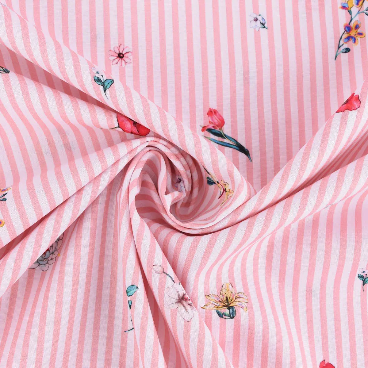 Baumwollstoff Popeline rosa mit feinen Streifen und bunten Blumen im Digitaldruck, Detailaufnahme der gefalteten Webware