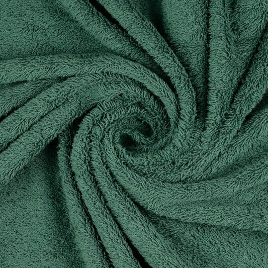 Frotteestoff uni dunkelgrün tannenfarbig mit dichter Schlingenstruktur, weicher und saugfähiger Baumwoll-Frottee in kräftigem Grünton
