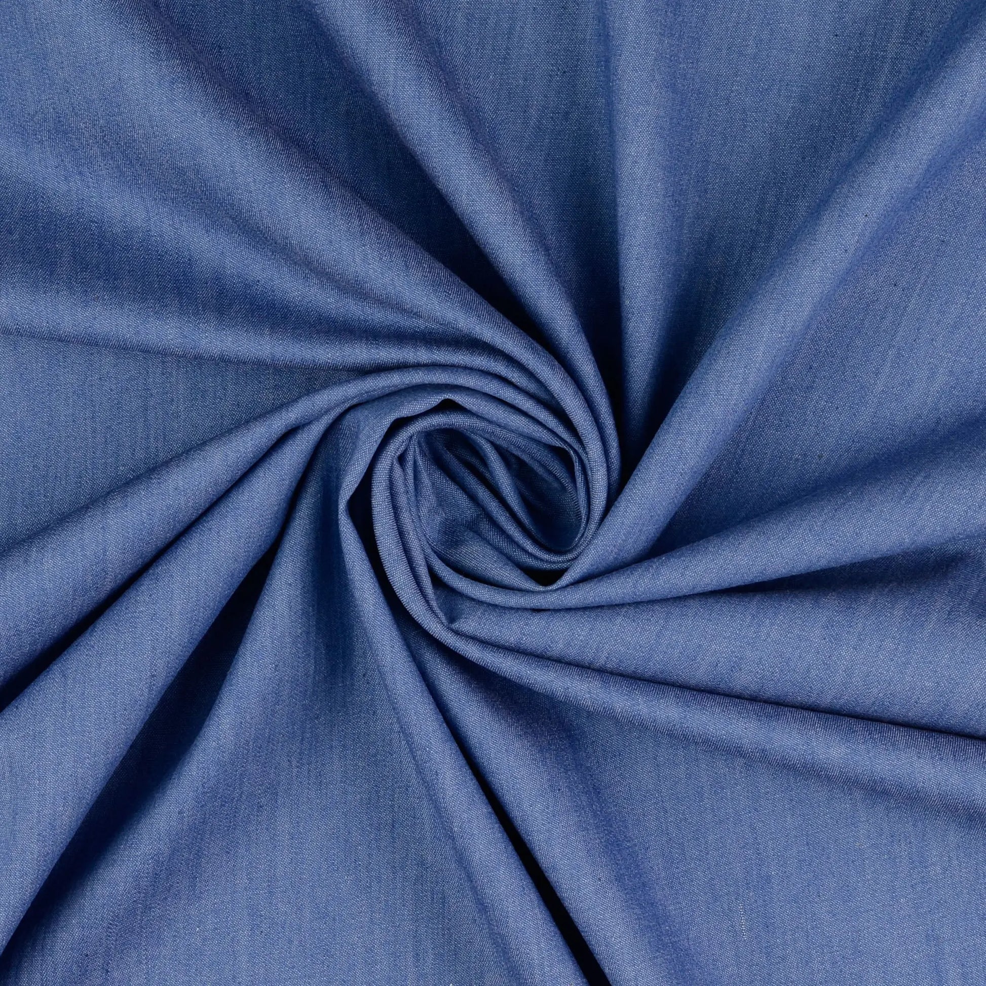 Weich fallender, gewaschener Jeans Stoff aus Lyocell in Jeansblau, uni, leicht und fließend